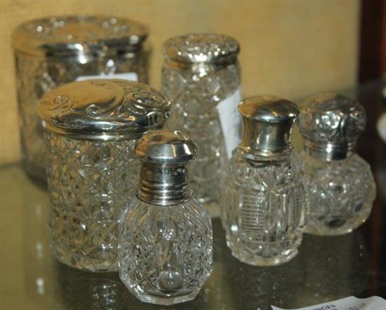 6 silver mounted glass bottles